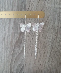 Rhodium Drop Earrings Featuring Shimmering Cubic Zirconia for a Radiant Look