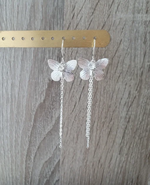Rhodium Drop Earrings Featuring Shimmering Cubic Zirconia for a Radiant Look