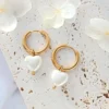 24K gold-plated hoop earrings with pearls, showcasing elegance and timeless beauty.