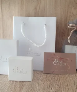 Elegant packaging for Radiant Flutter Earrings – Includes gift box and organza bag for a perfect presentation.