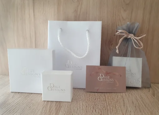 Elegant packaging for Radiant Flutter Earrings – Includes gift box and organza bag for a perfect presentation.