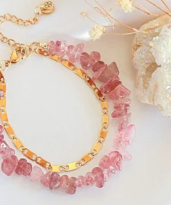 Double-layered Strawberry Quartz bracelet with 24K gold accents styled on a neutral background.